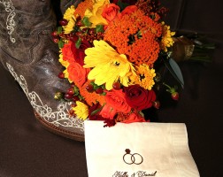 Fall wedding bouquet atop wedding napkin