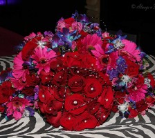 Reds pinks lavenders turquoise bridal bouquets
