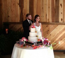 Beautiful wedding reception held at the Stanley Farm events barn pavillion featuring the Dylan Smith and Logan Belton wedding couple after their marriage vows.