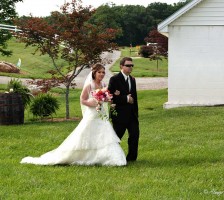 Gorgeous outdoor wedding held at the Stanley Farm in Sandy Ridge, NC.  Logan Belton marries Dillon Smith in a perfect rustic farm setting where the weather was partly sunny with a pinch of chilled temperatures.