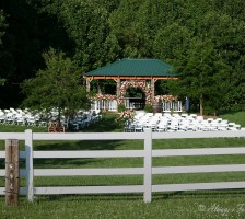 Gorgeous outdoor wedding held at the Stanley Farm in Sandy Ridge, NC.  Logan Belton marries Dillon Smith in a perfect rustic farm setting where the weather was partly sunny with a pinch of chilled temperatures.