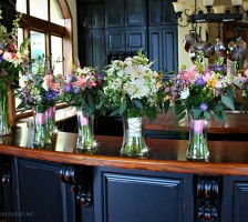Gorgeous bridesmaids bouquets displayed at the Bella Collina Mansion kitchen.