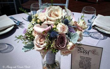 Bridal Bouquet On Reception Table