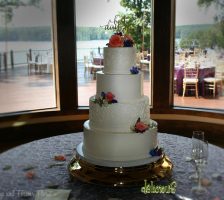Four Tier Wedding Cake By Delicious Bakery In Greensboro