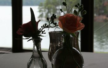 Wedding Reception Table Floral Pieces In The Shadows