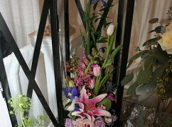 Gorgeous Orchid And Lily Wedding Arrangement In Black Lantern