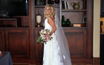 Gorgeous bride displaying her bouquet
