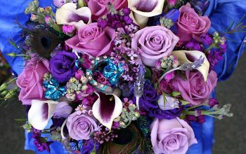 Bridal bouquet with peacock plumes and bling