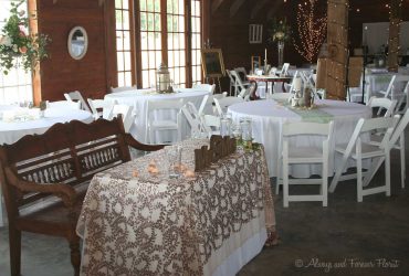 Quaint bride and groom reception table