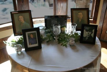 Wedding memorabilia table with candles