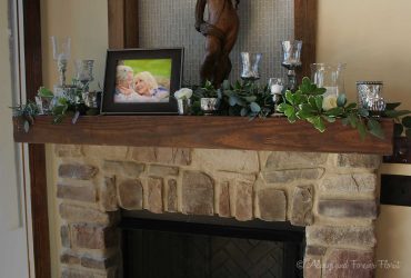 Wedding memorabilia fireplace mantle