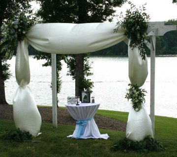 Creamy white pergola arrangements