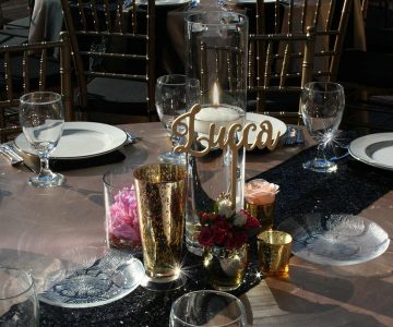 Floating candle wedding reception table setup