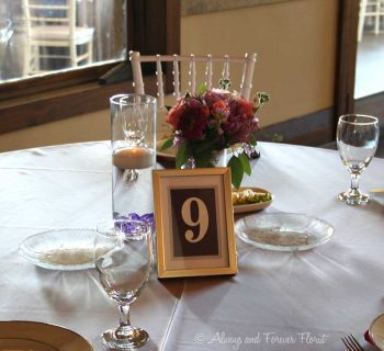 Simple floating candle reception table setup