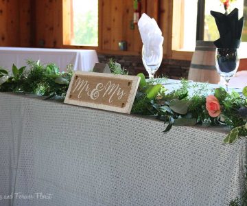 Simple floral decor for brides table
