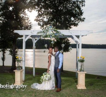 Bride and groom by the lake als photography