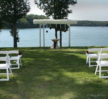 Wedding chair rose adornments