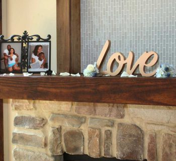 Wedding memorabilia on bella collina hearth