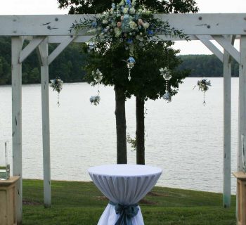 Wedding pergola spray with hanging crystals