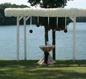 White hydrangea pergola top bar