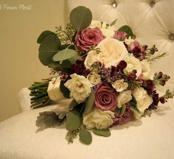 Elegant bridal bouquet with ruscus and dusty miller