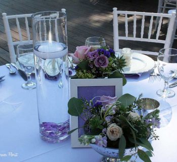 Lavender rocks under floating candle