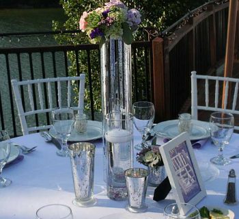 Tall mercury containers for reception table