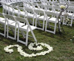 White rose petals along the aisle