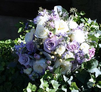 Bridal bouquet amongst ivy