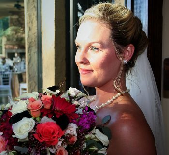 Gorgeous sun drenched bride and bouquet