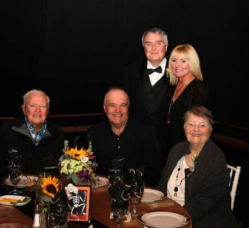 Jovial wedding guests and family