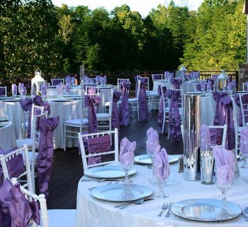 Lanterns and tall crystal vases