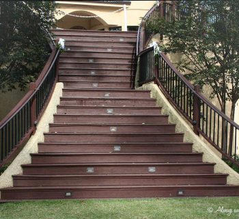 Simple white bow rail adornments